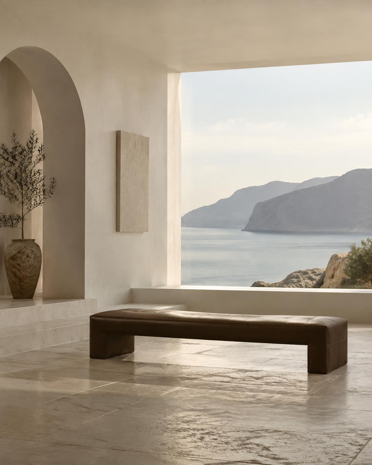 Minimal architectural interior with open sea view